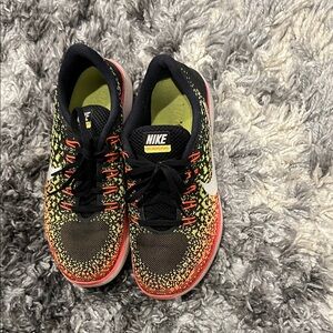 SOLD.  Nike Black and Yellow Running Shoes